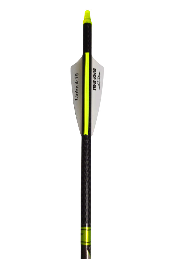 A single carbon fiber archery arrow centered on a plain white background, featuring a black and dark gray carbon fiber shaft, a bright neon yellow-green nock, a matching neon yellow-green center stripe, and white fletching with black branding.
